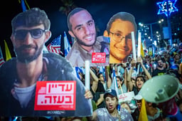 Families of hostages, former hostages, and supporters march to the U.S. embassy branch in Tel Aviv, calling for the release of all hostages, July 19, 2025. 