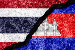 Wall crack separate between Thailand flag and Cambodia flag for government conflict from border of both countries concept.
