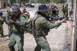 Members of an Emergency Squad train in urban warfare, northern Golan Heights, June 11, 2025. 