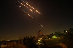 Anti-missile system fires interception missiles as missiles fired from Iran, as seen near the Israeli border with Lebanon June 18, 2025. 