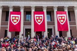 Students of Harvard University gather for their graduation ceremonies on Commencement Day