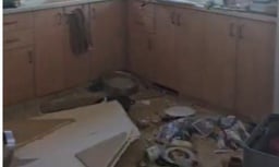 One of the damaged houses.