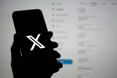 X logo on cellphone