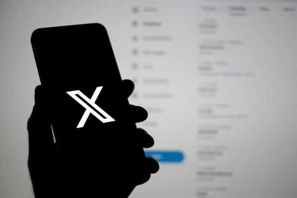 X logo on cellphone
