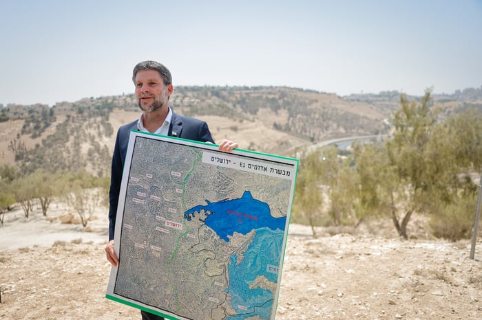 Israeli minister of Finance Bezalel Smotrich at a press conference announcing his plans to approve more than 3,000 housing units in the E1 settlement project between Jerusalem and Ma’ale Adumim, August 14, 2025