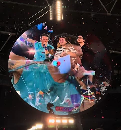 Chris Martin and Israeli fans on stage