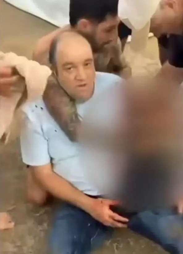 civilian hero Ahmad Al-Ahmad after the attack