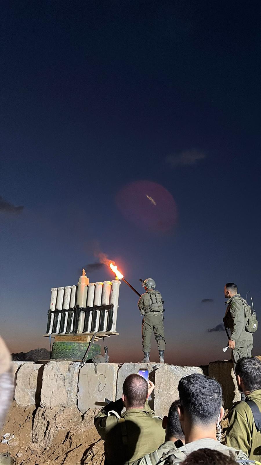IN COLOR: IDF Soldiers Light Candles on First Night of Hanukkah