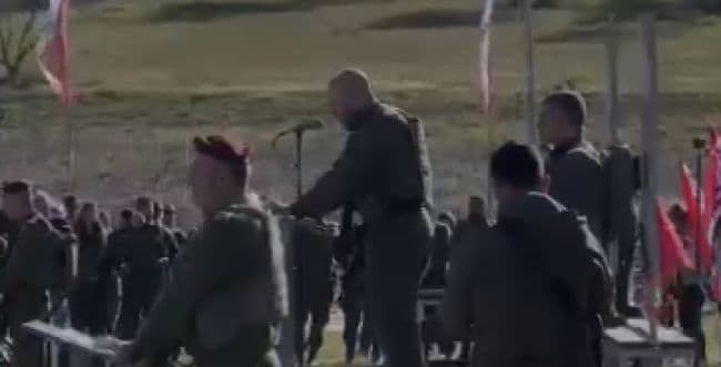 Speaking to the troops.