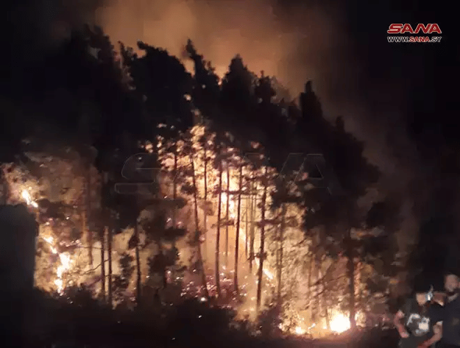 A fire that broke out following the alleged Israeli strike on Syria on Oct. 8, 2024 