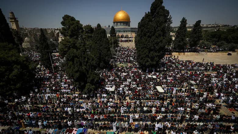 Muslim worshippers praying at Al Aqsa Mosque