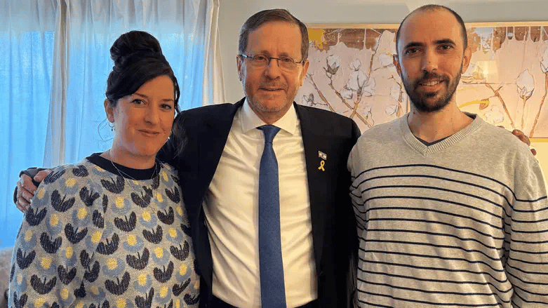 Tal Shoham and his wife with President Herzog