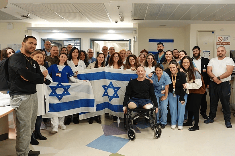 Elisha Medan in center of picture