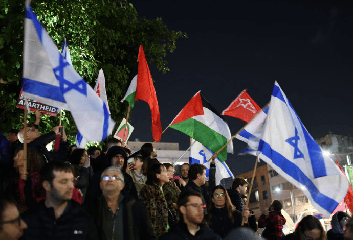 Jews and Arabs demonstrating against the war