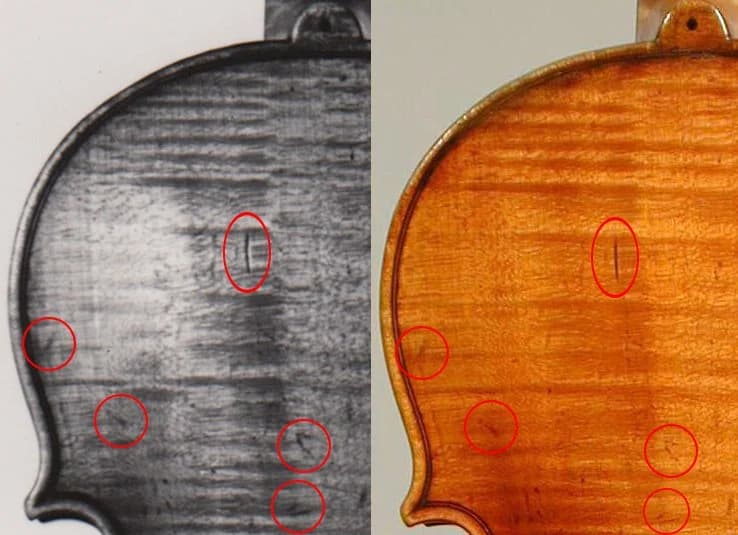  Photo identifying the stolen violin by distinctive markings