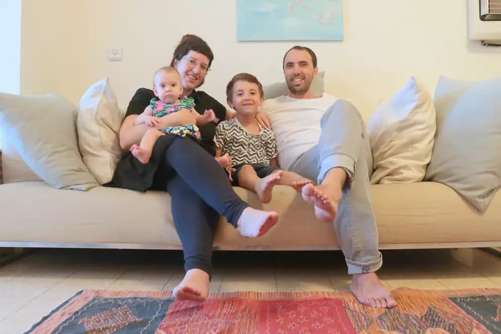 Hostage Tal Shoham with his family before October 7