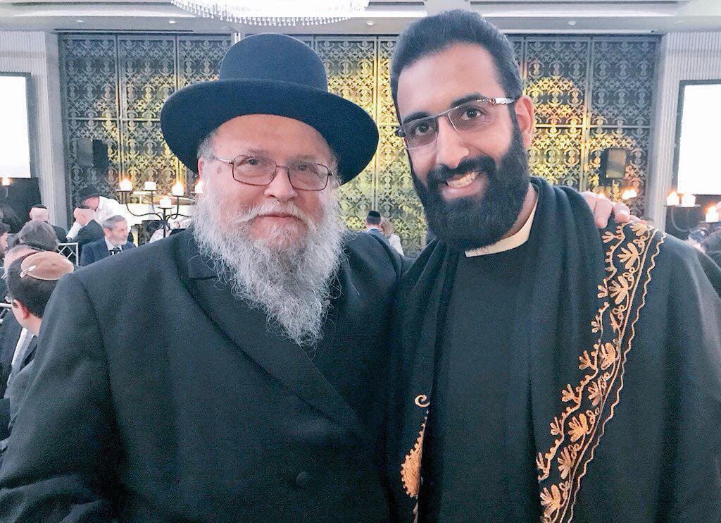 H.E. Imam Mohammad Tawhidi with a Jewish friend.