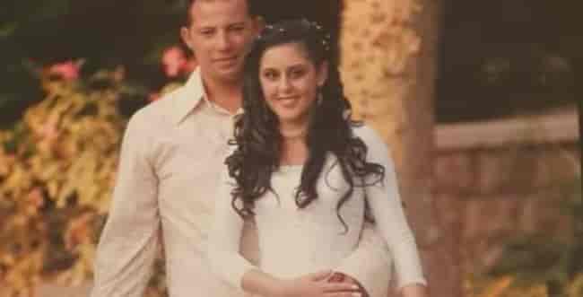 The couple at the wedding background