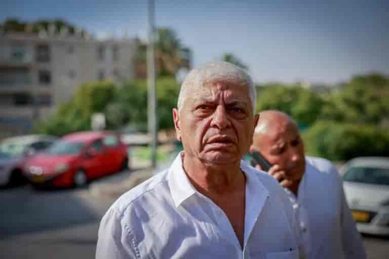 Benny Kashriel at the scene of the attack background