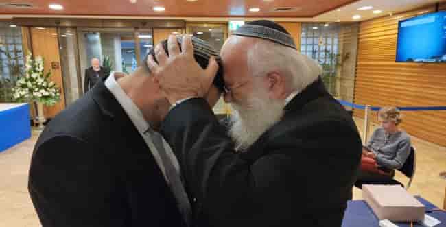 Yitzhak and Issachar Wasserlauf background