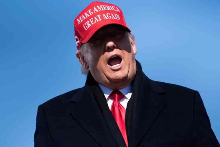 Absent from the debate, Trump background
