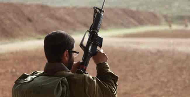 An ultra-Orthodox soldier in combat service background