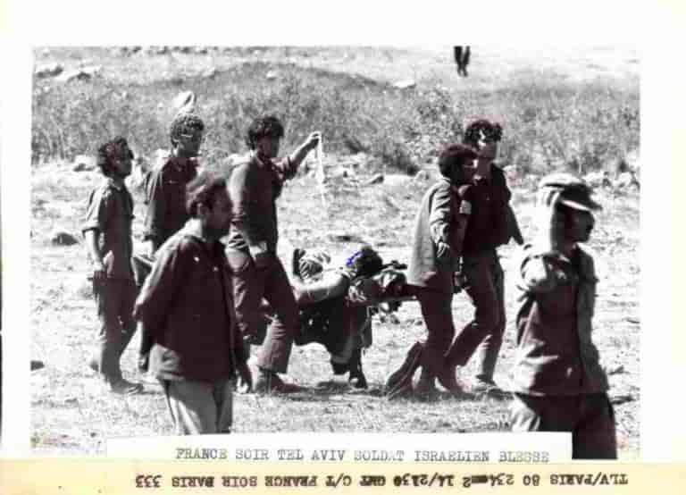 The battles are very difficult. Evacuation of the wounded in the combat zone background