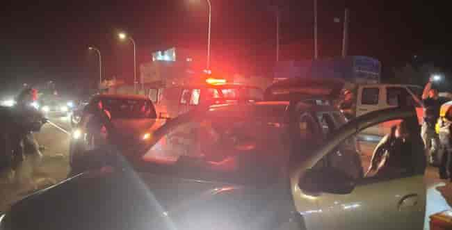 The scene of the attack in Hawara background