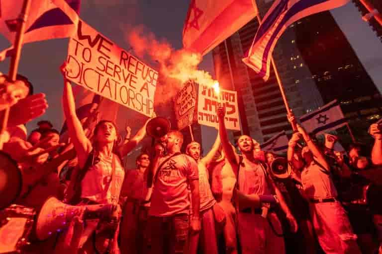 Demonstrators at Kaplan background