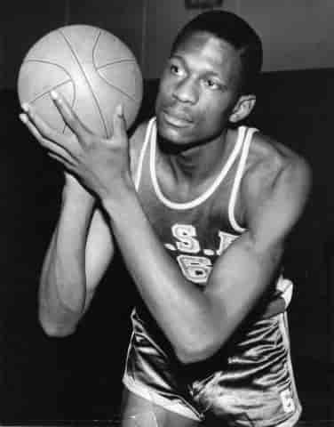 Bill Russell in the Celtics uniform background