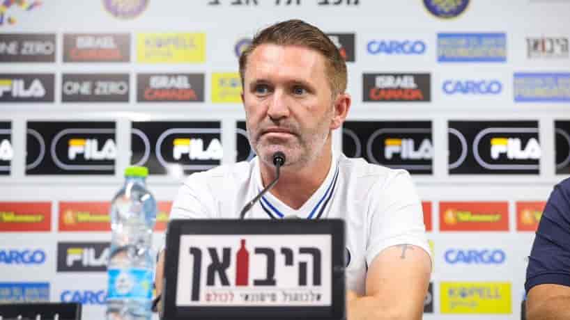 Robbie Keane at the press conference background
