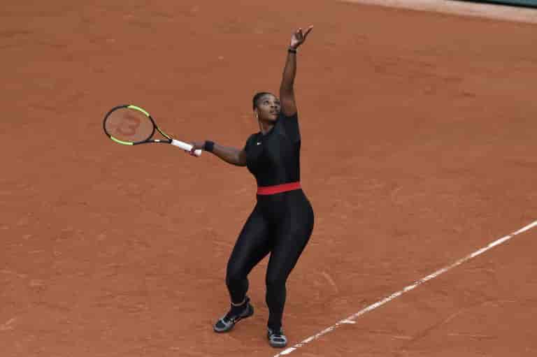 Serena Williams with the Black Panther outfit background