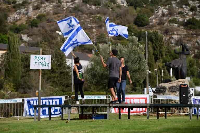 Demonstrators near the hotel background