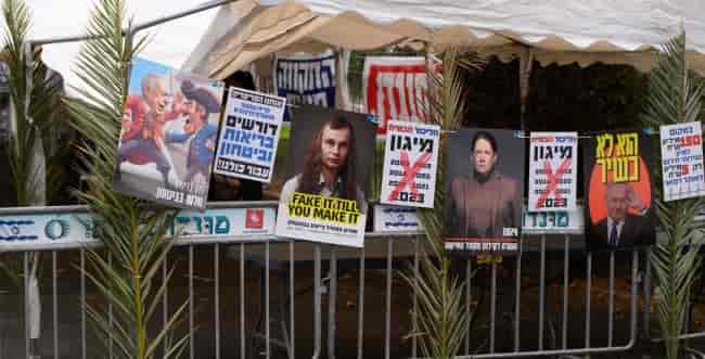 The protesters near Neve Ativ background