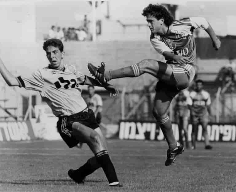 Reuven Atar in Maccabi Haifa's uniform, Ronny Rosenthal gave him the pass for the winning goal against France background