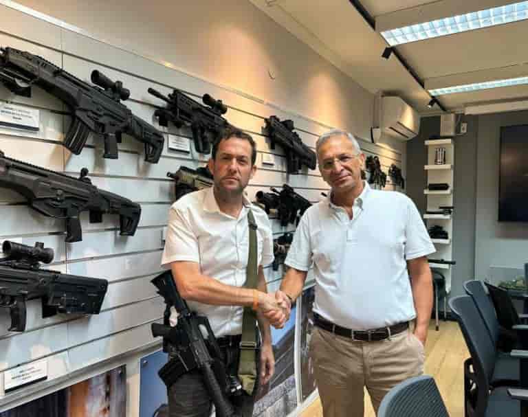 An arms buying spree. background