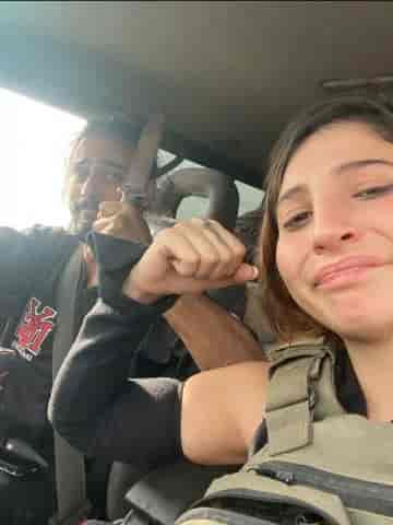 Lali and Dor with the knife they took with them for protection background