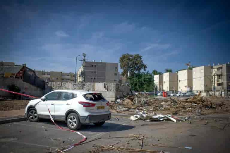 Sderot wreckage following a Hamas attack. background