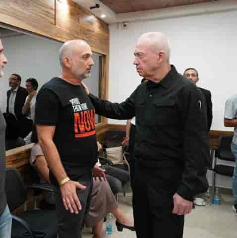 Gallant comforts the families of captives and missing. background
