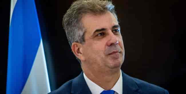 Foreign Minister Eli Cohen. background