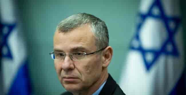 Justice Minister Yariv Levin. background