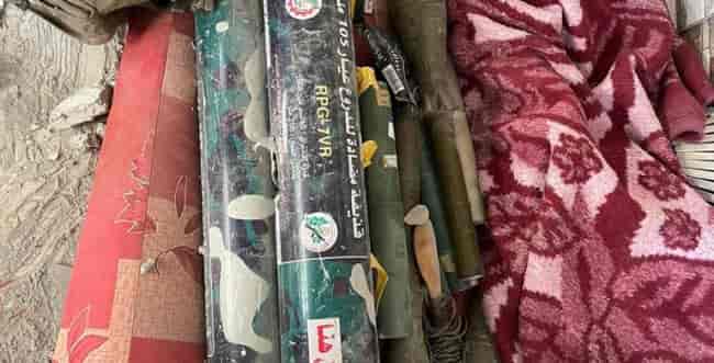 Weapons seized in the Gaza Strip background