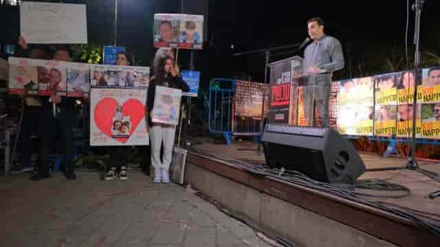 Protest for the hostage children in front of UNICEF. background