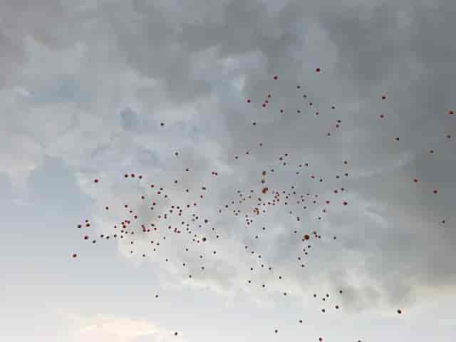The balloons are in the air background