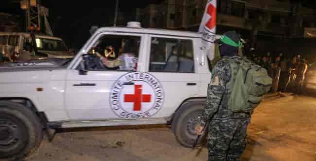 Delivering hostages to the Red Cross background