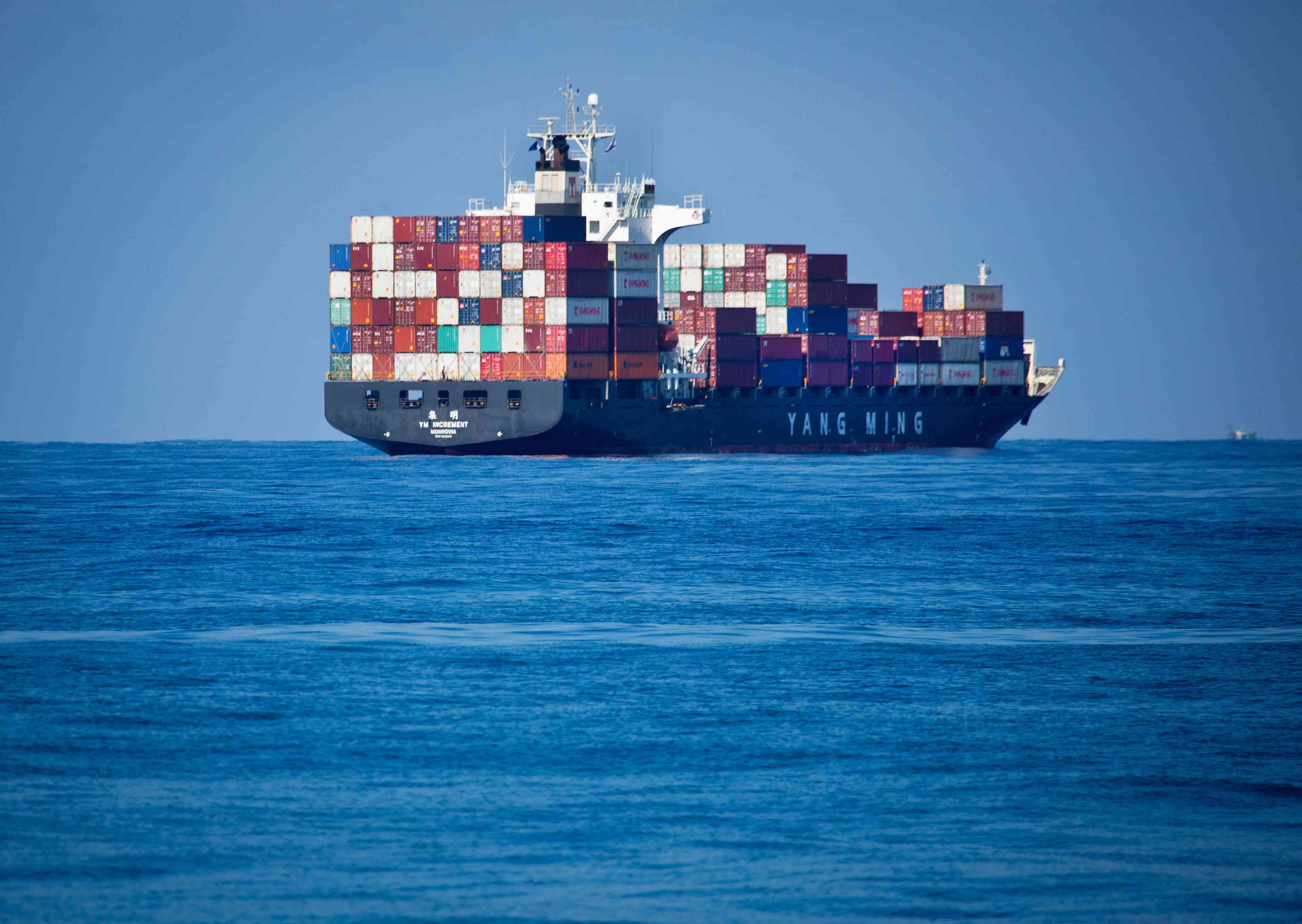An international effort to stop a naval blockade. Cargo ship off Ashdod Port. background