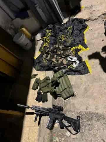 The weapons seized at the scene background