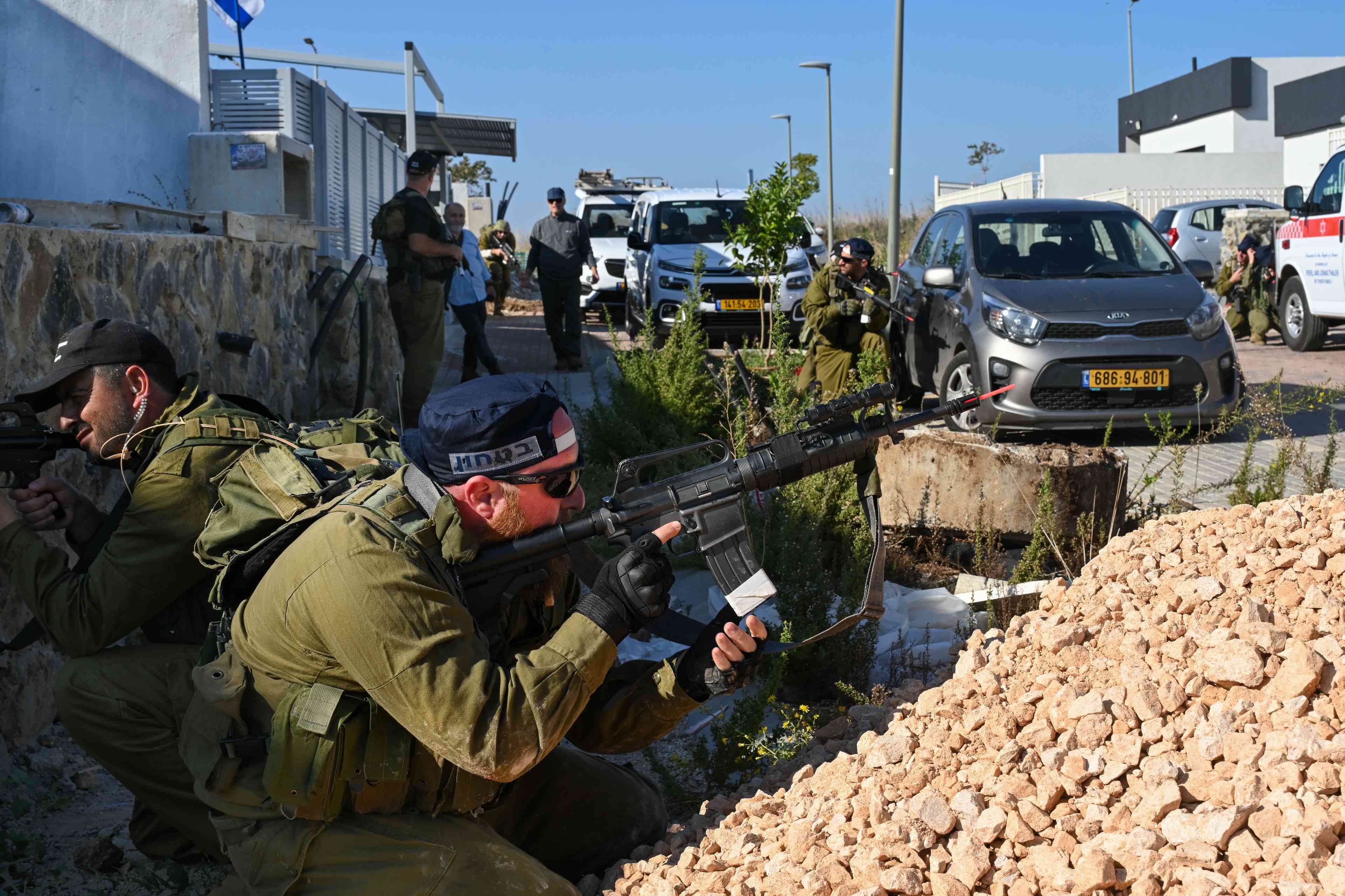A future army reliant much more on manpower than technological tripwires. Emergency response team practicing in the north. background