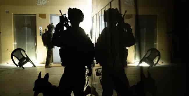 The soldiers in the hospital background