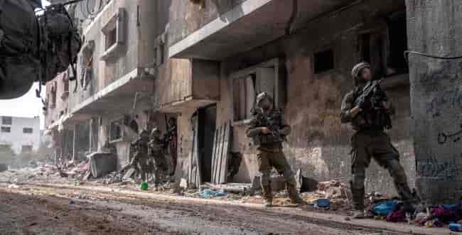 IDF soldiers in Khan Yunis, Gaza. background